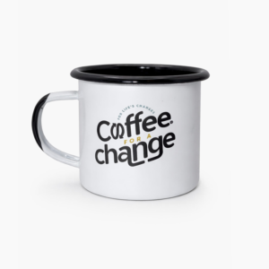 White enamel camping mug with black rim and handle, and Coffee for a Change logo