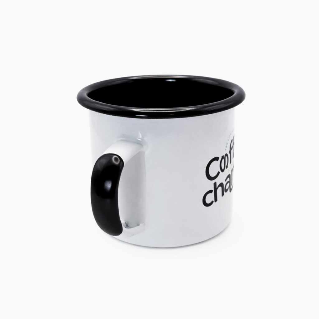 White enamel camping mug with black rim and handle on clean white background, side view product photo
