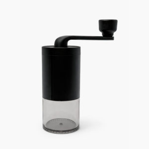 Manual coffee grinder with matte black body and clear grounds container